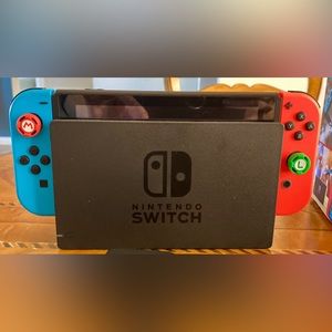 Nintendo Switch, rarely used, perfect working order, 4 SD games with case.